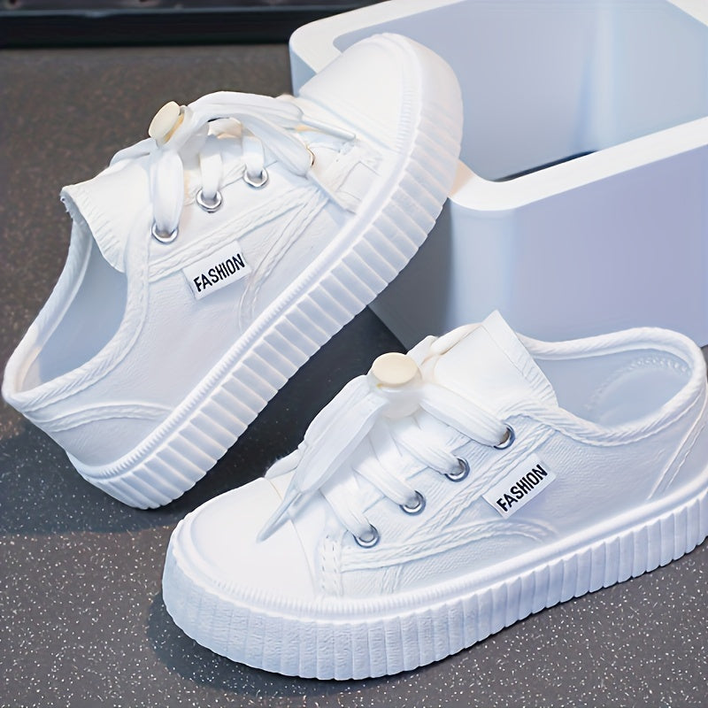 Casual, comfortable low top sneakers for girls made of lightweight, non-slip canvas for all seasons.