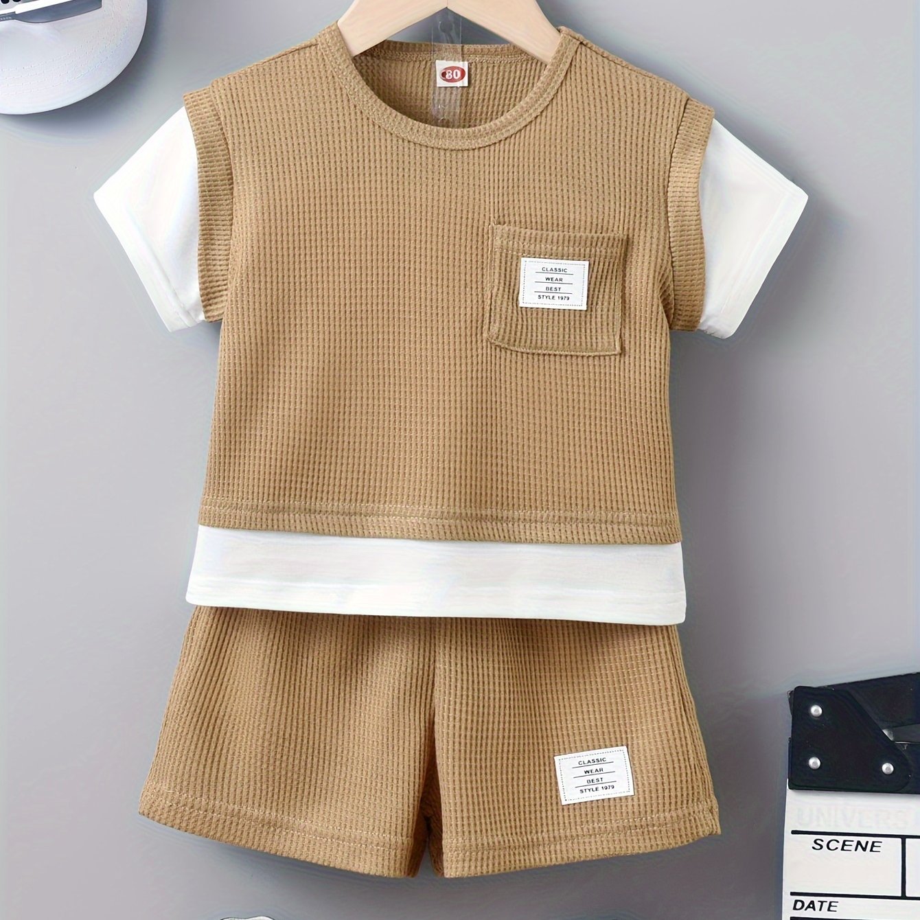 Kid's summer outfit with waffle textured t-shirt and casual shorts.