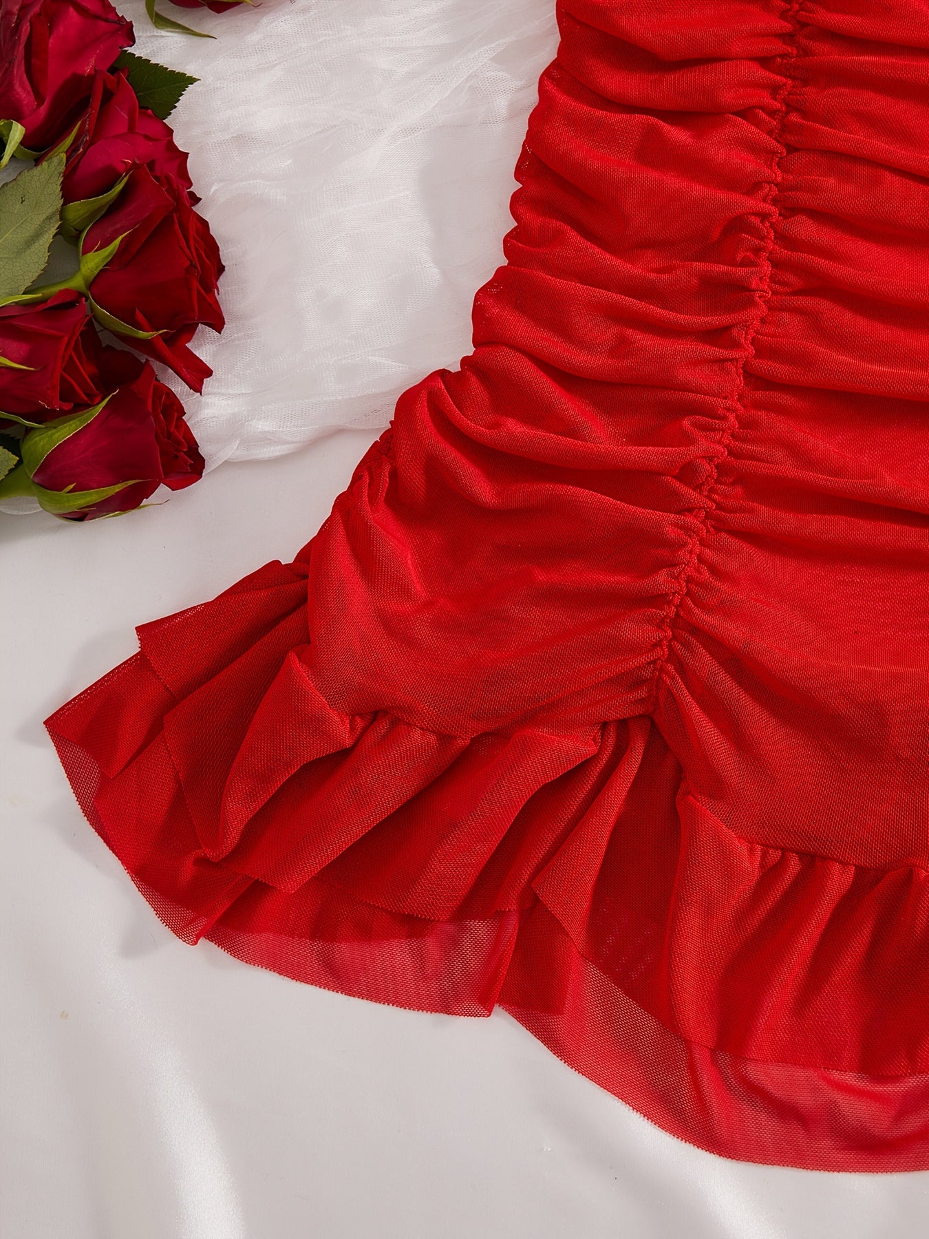 Red lace lingerie dress with bow detail, solid color evening wear for women.