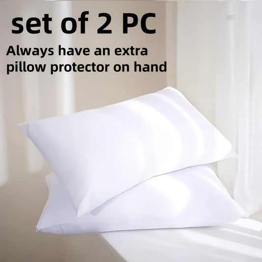 Two white zippered pillow protectors with a luxurious hotel quality design, made from 100% polyester for breathability and softness. These covers will extend the life of your pillows and do not include pillow inserts.