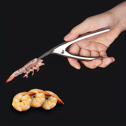 Effortlessly remove shrimp shells with this stainless steel deveiner peeler featuring a comfort grip handle. This kitchen utensil is designed for easy shrimp preparation and is made with food contact safe material.