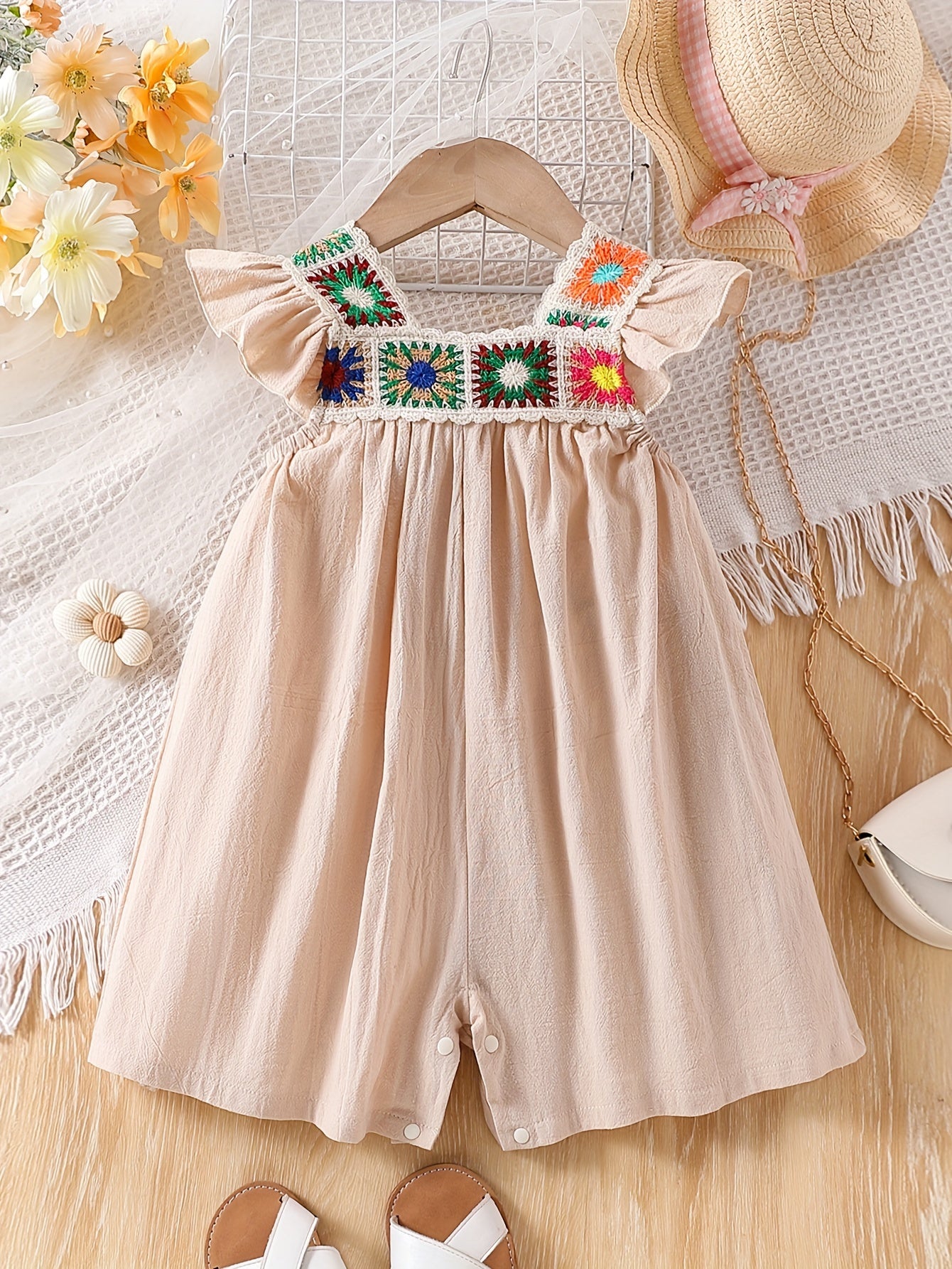 Baby girl summer romper with wide-leg skirt pants and ruffle sleeve vest, perfect for climbing and stylish fashion.