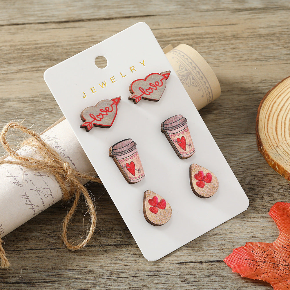 Get 9 pairs of women's fashion earrings for Valentine's Day, including pink rose love earrings, wooden cupid's arrow calendar earrings, coffee cup love earrings, palm bier earrings, and more. These earrings are made from wooden materials and will make