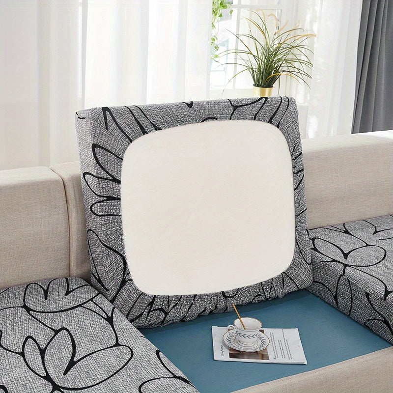 Polyester sofa slipcover for non-slip furniture protection in home decor.