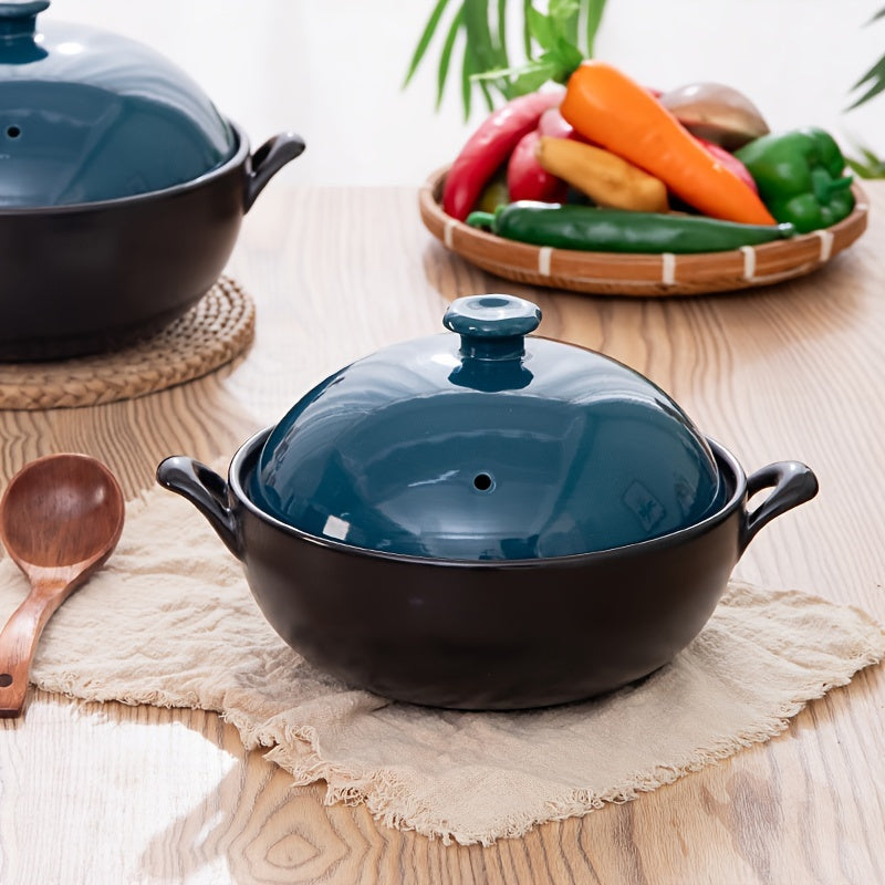 High-quality ceramic wok with emerald green lid, designed for high temperatures and non-stick cooking. This versatile stew pot is perfect for use on open flame gas burners, ideal for making soup or steaming dishes in your kitchen. A must-have addition to