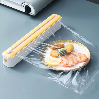 This ABS Plastic Wrap Dispenser features a Slide Cutter and can be used for both Cling Film and Foil. It is a 2-in-1 tool that is refillable and designed for storing and cutting kitchen drawer fresh-keeping film packaging. Please note that it is not