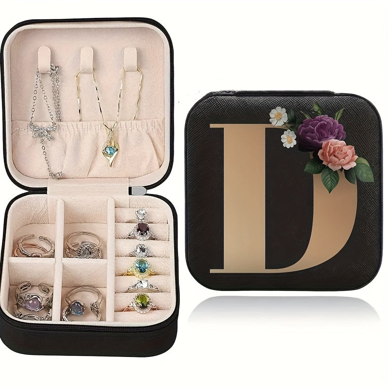 Floral initial jewelry organizer box with compact design, soft velvet lining, durable zipper, and lightweight, ideal for jewelry organization and travel.