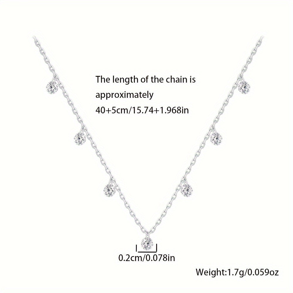 This elegant collarbone chain designed for women is crafted from 925 silver with stunning zirconia inlays. It shines beautifully and is perfect for both travel and everyday wear. Lightweight and low allergy, weighing approximately 1.7g.