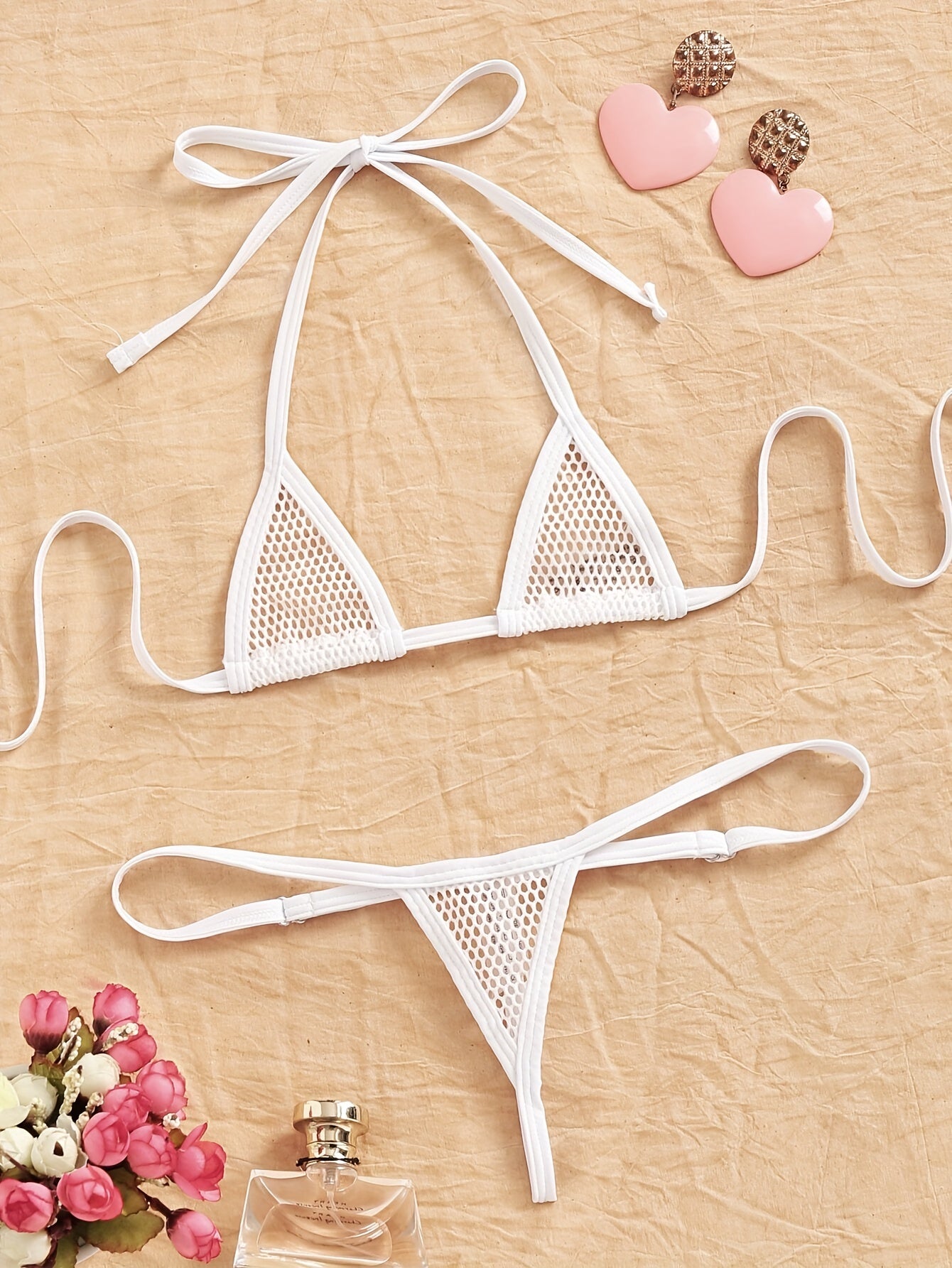 Mesh triangle bra and panty set for women, made of polyester and spandex.