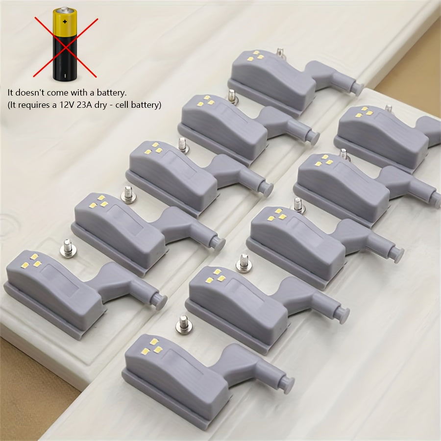 12-pack of STAR ORANGE Cabinet Hinge LED Lights with motion sensor for various rooms, warm and white light, gray plastic design, battery-operated (batteries not included).