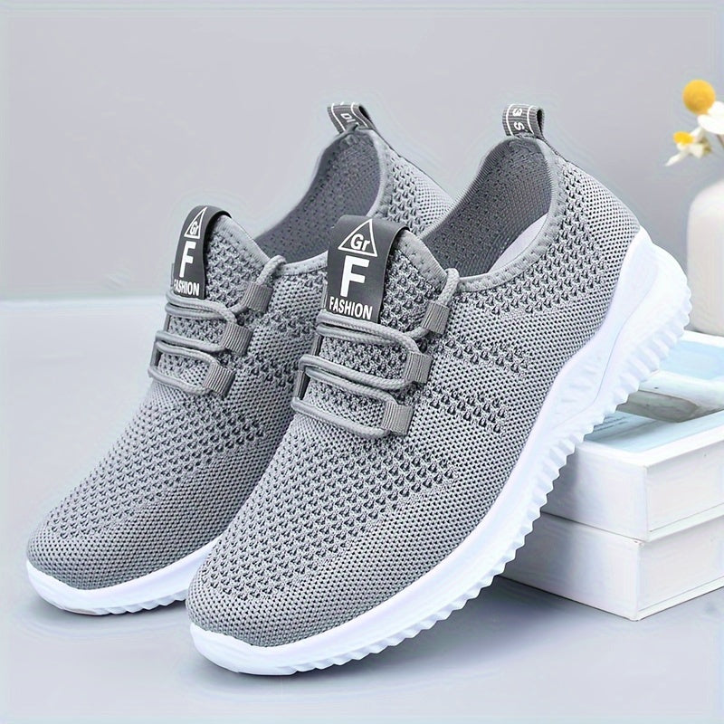 One pair of lightweight, breathable women's sports shoes suitable for vacations.