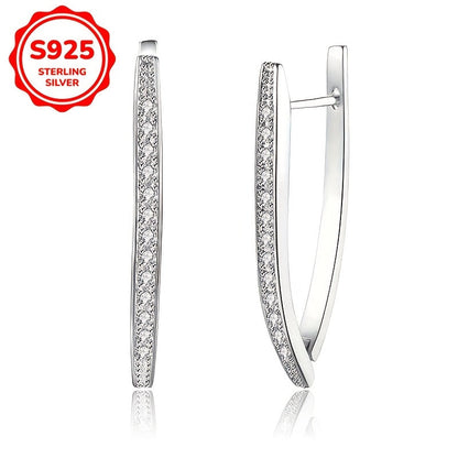 These stunning women's fashion earrings boast a high-end, sophisticated design with V-shaped inlaid synthetic zirconia, weighing 5.5 grams in a silvery hue. Perfect for everyday wear, vacations, parties, banquets, or as a luxurious gift.