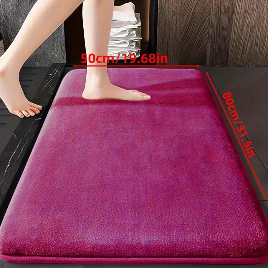 Soft and durable polyester bathroom mat with geometric design, ideal for shower, bathtub, bedroom, and living room. Versatile and non-slip, it is highly absorbent and machine washable.