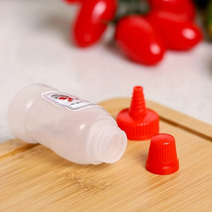 Set of 4 mini sauce bottles for salads, ketchup, honey, and soy sauce - BPA-free plastic dispensers for kitchens and restaurants.