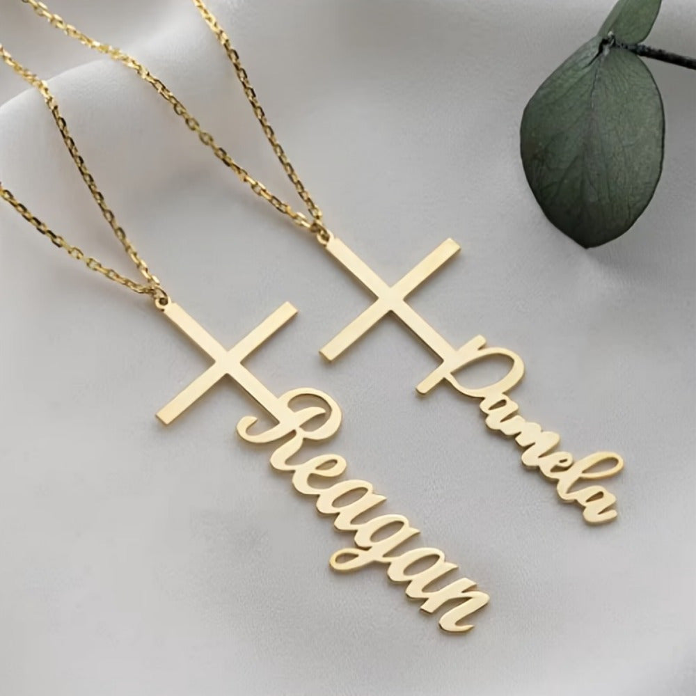 Personalize a name necklace pendant featuring a Middle Eastern style cross. Crafted with elegant stainless steel, this piece is perfect for everyday wear or music festivals. Share warm messages at parties or on vacation with this trendy and elegant