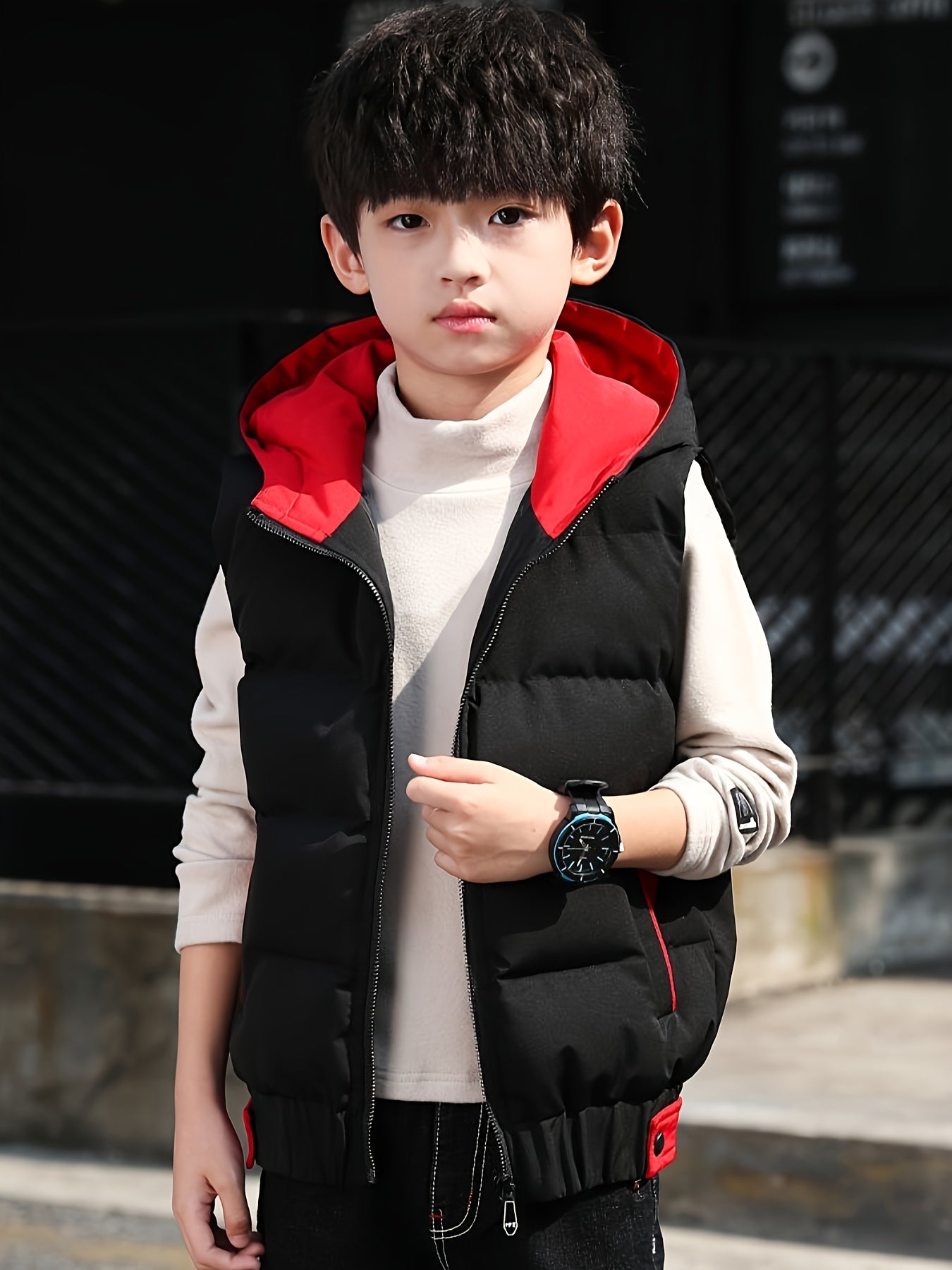 Boys' warm zip-up hooded vest with pockets, cozy color block top for fall and winter.