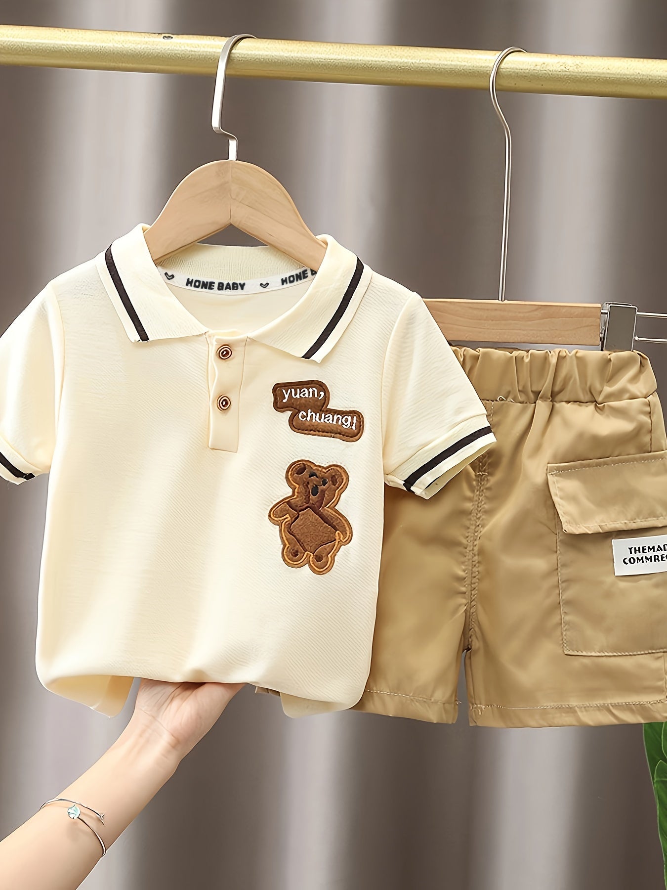 Infant boys' adorable bear embroidered summer outfit with short-sleeve golf shirt and pocketed shorts, perfect for outdoor activities.