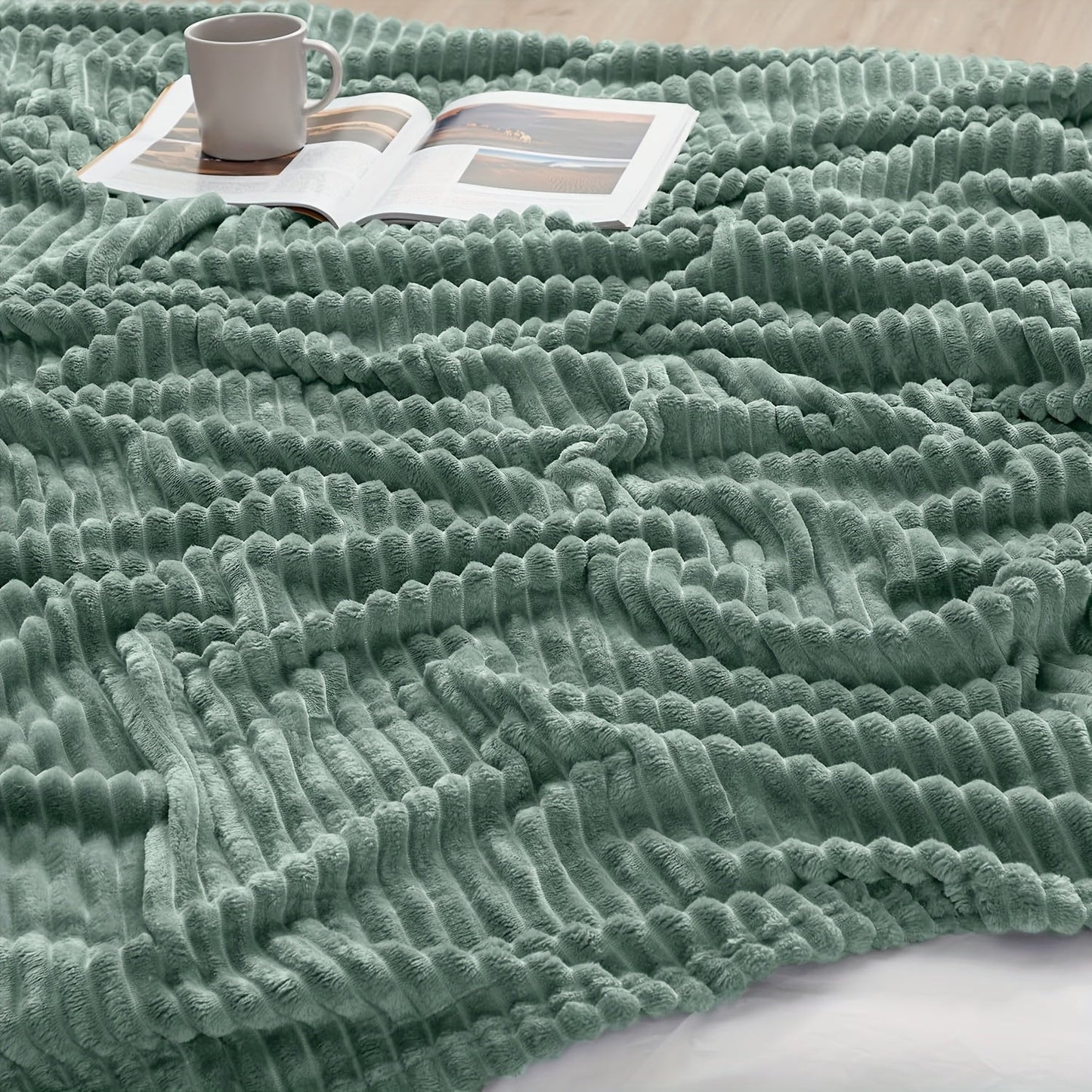 Stay cozy and warm with our Ultra-Soft Oversized Fleece Throw Blanket. Made with lightweight and warm 280GSM microfiber, this blanket features a 3D ribbed Jacquard design for added style. Hypoallergenic and perfect for all seasons, this blanket is a