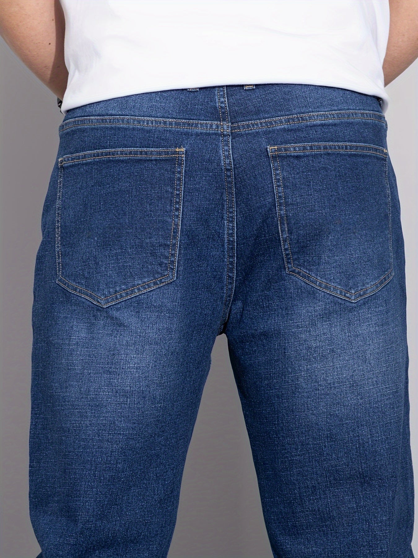 Cotton denim jeans for men in plus sizes, designed for comfort in all seasons with a regular fit.