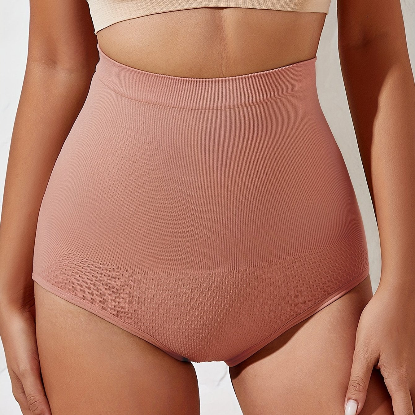 High waist solid briefs that are comfy, seamless, and slimming, ideal for women's lingerie and underwear.