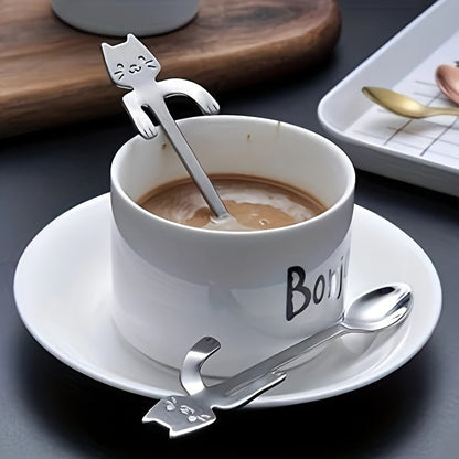 The cute Cat Coffee Spoon features a hanging stainless steel stirring spoon with a cat handle, perfect for stirring tea or coffee (Silver)