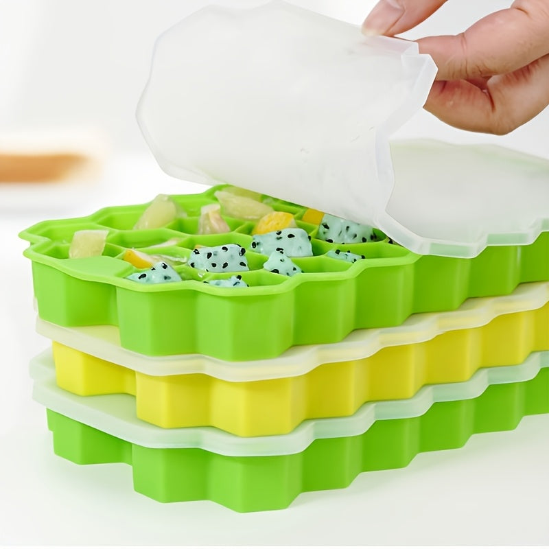 The Silicone Honeycomb Ice Tray is designed with 37 compartments and a lid for easy storage. Made of durable silicone, this tray is perfect for creating hexagonal ice cubes and can also be used for making chocolate, wax bottles, and candy. The flexible