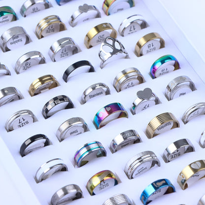 Set of 20 Fashion Rings crafted from durable Stainless Steel featuring a Wide Band and Adorable Heart Design. Perfect for mixing and matching with everyday outfits, suitable for both Men and Women. Comes packaged in an Opp Bag.