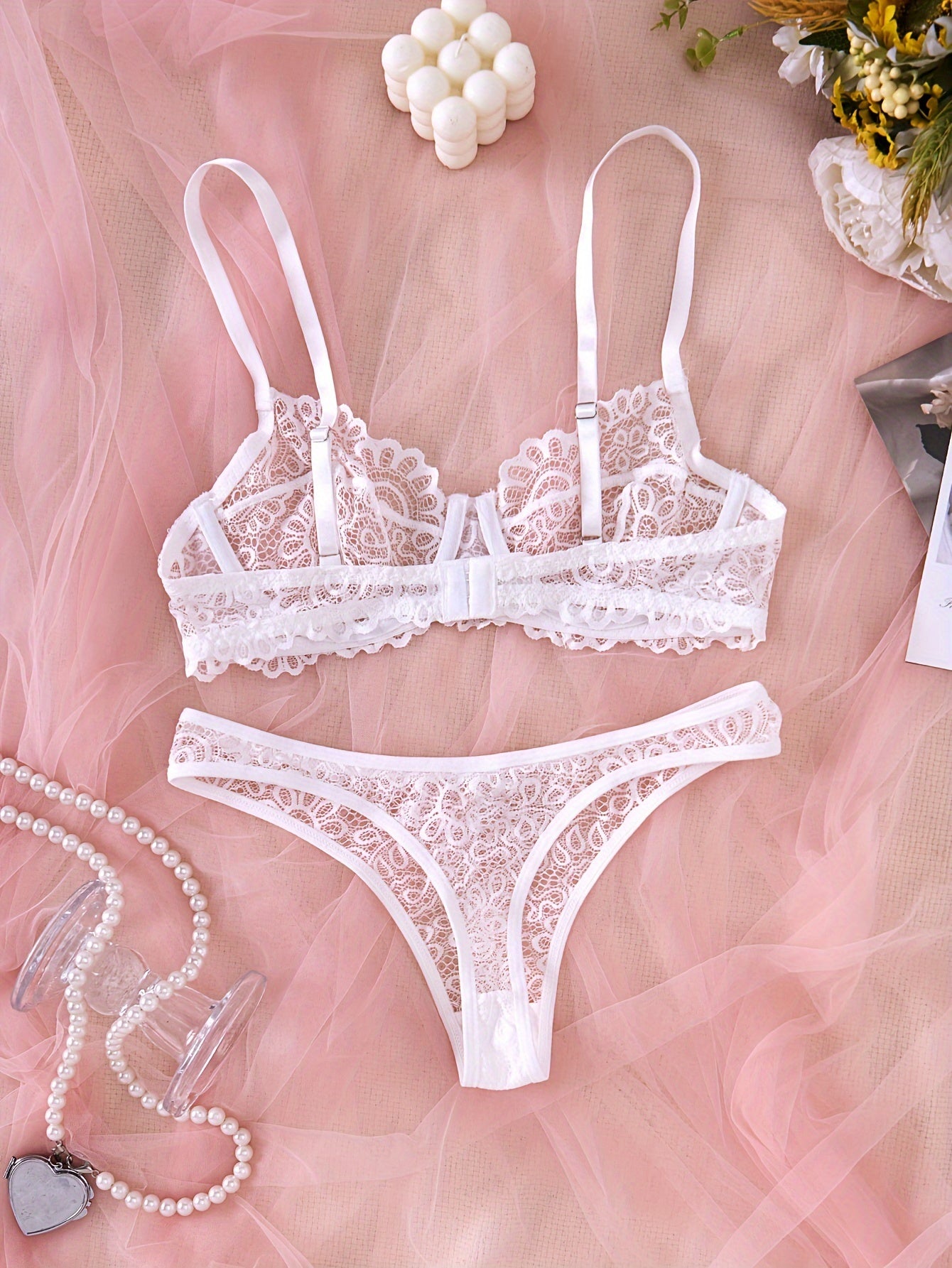 Lace bra and panty set with mesh details, revealing yet comfortable design.