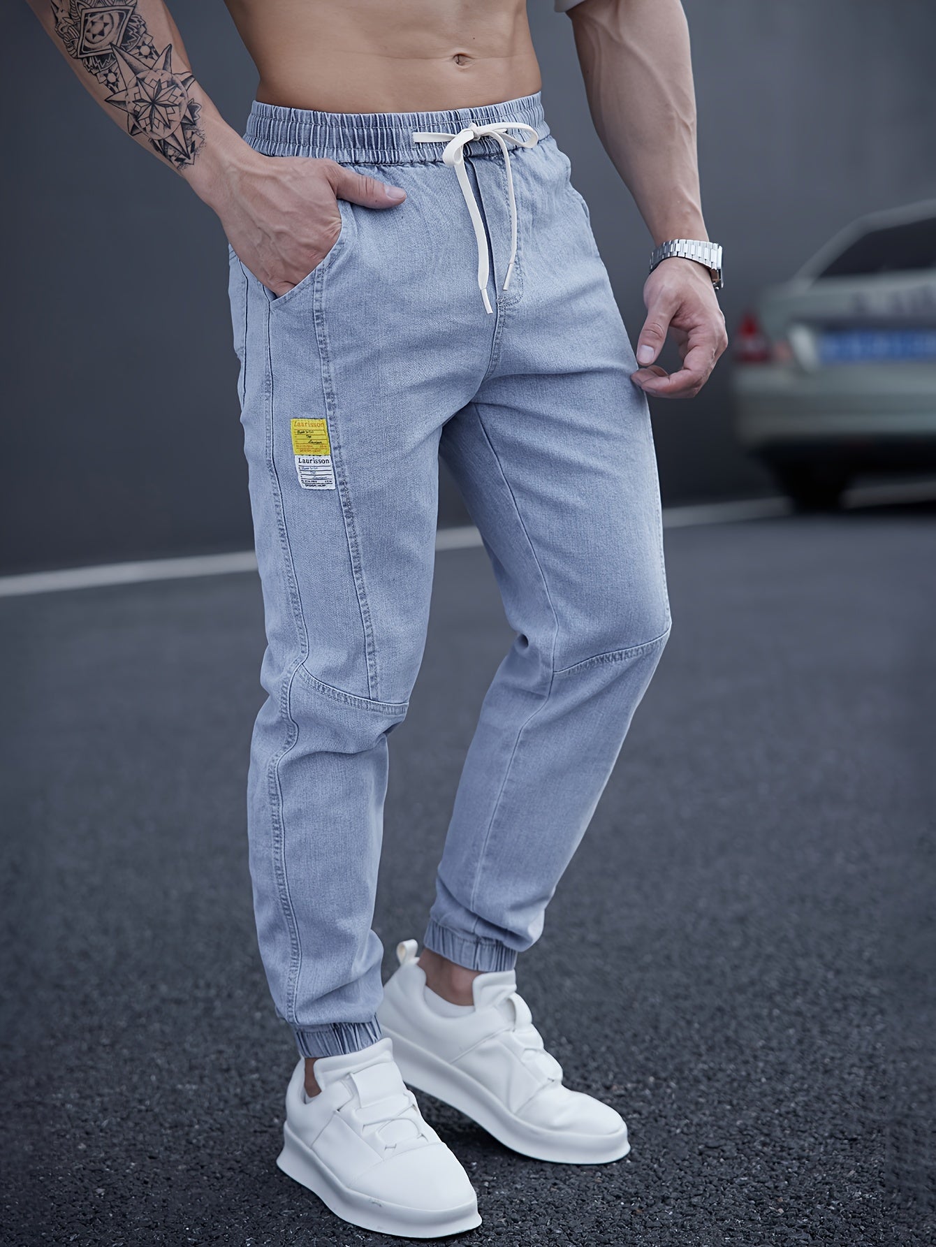 Trendy men's tapered jeans with waist drawstring