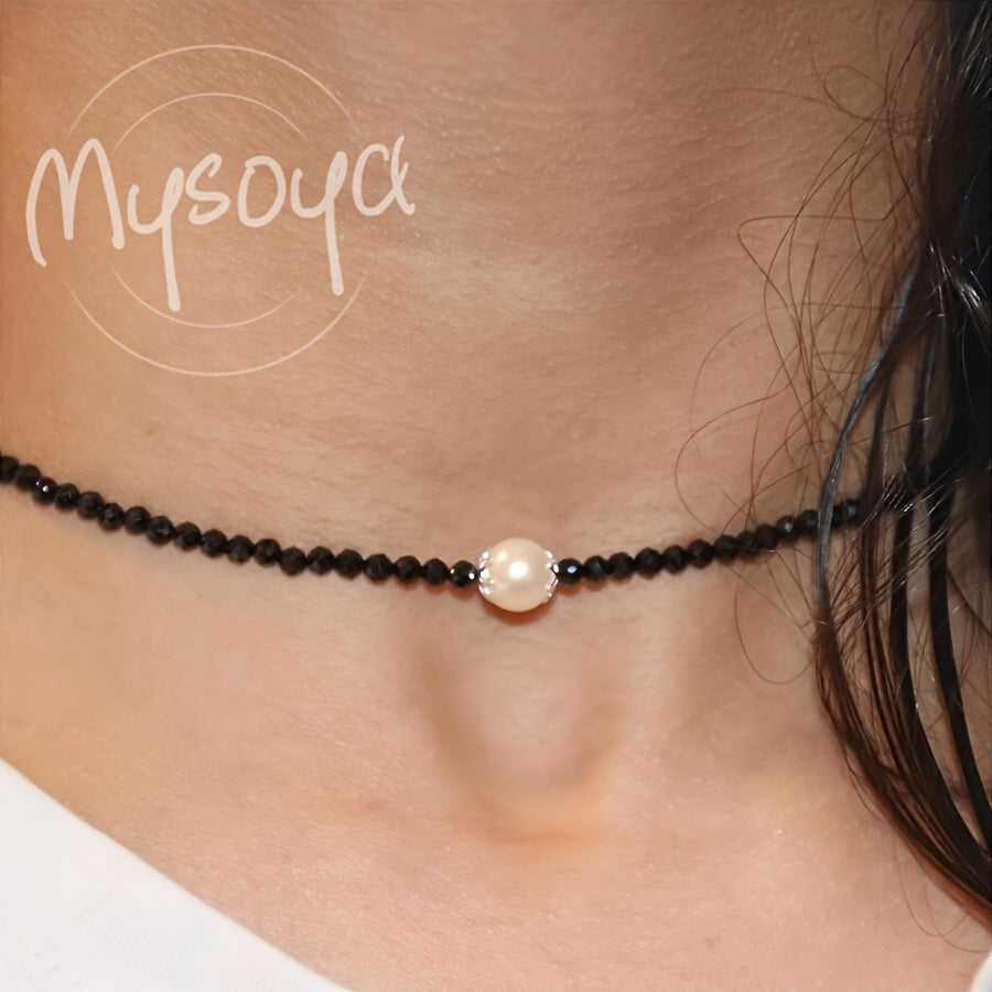 This exquisite Black Onyx and Freshwater Pearl Necklace is lovingly handcrafted and is the ideal gift for anyone. Whether it's for her or him, this timeless piece is perfect for daily wear or special occasions like weddings. The Black Onyx gemstone is