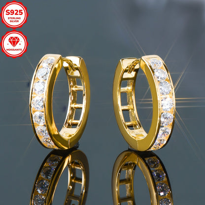 These stunning hoop earrings are crafted from 925 sterling silver and feature dazzling D color 2.5mm round moissanite stones in a track setting. The inner diameter of the earrings is 13mm, and they come with a GRA certificate. The total weight of the