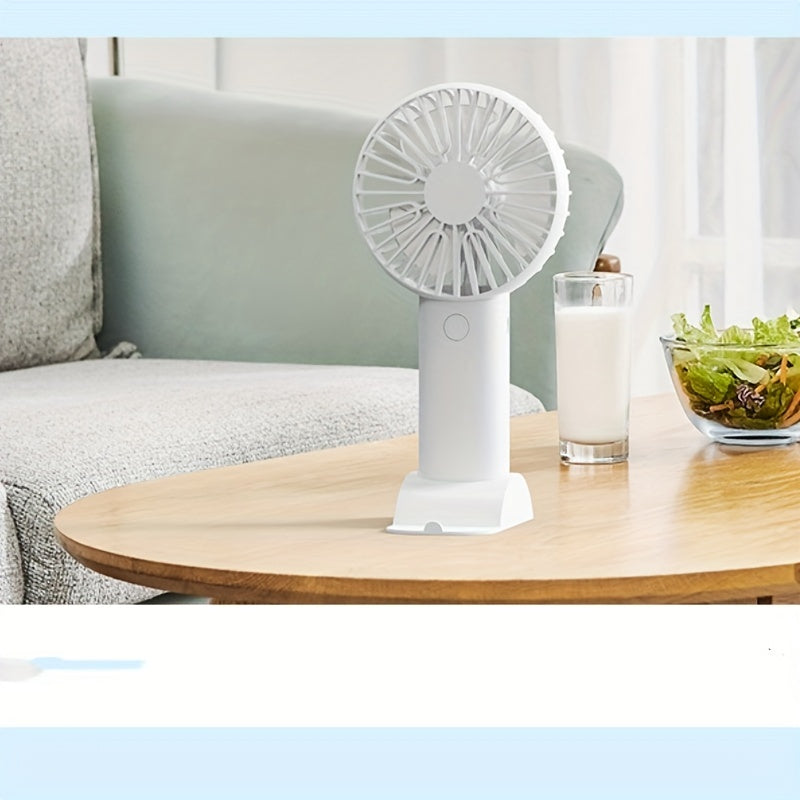 Portable USB Mini Fan in White, Blue, and Pink with Touch Control - Perfect for Office, Travel, Camping, and Picnics. Wearable design makes it convenient to carry around. Rechargeable with Built-in Lithium Battery for on-the-go cooling. Get the Mini Fan