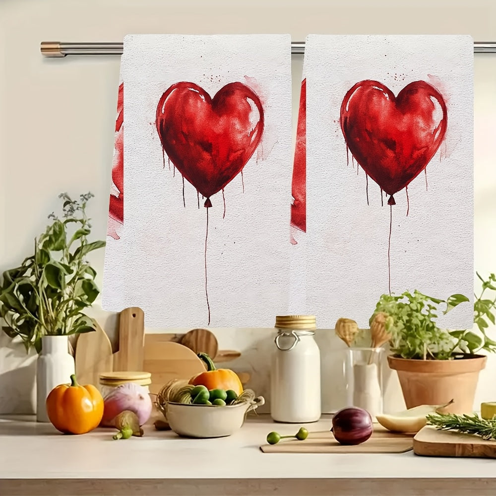 Two pieces of ultra soft kitchen towels featuring a Valentine's Day heart balloon design. These towels are highly absorbent and machine washable, making them perfect for dish and hand drying. With a contemporary style and measuring 40.64x60.96 cm, these