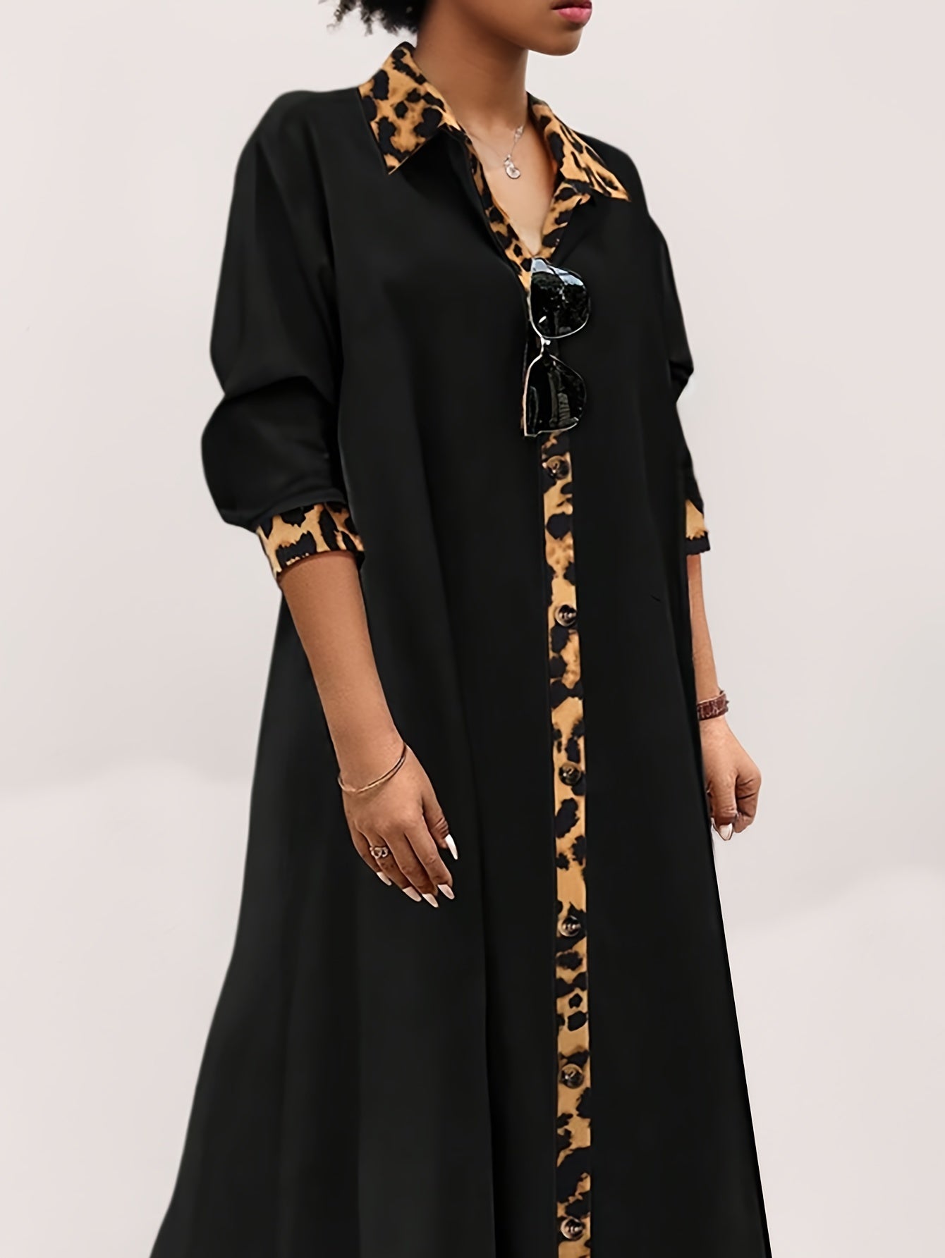 Plus Size Elegant Leopard Print Trim Long Dress with Regular Sleeves made of Women's Polyester Blend. This dress features Non-Stretch Fabric, Long Sleeve, Straight Hem, Loose-Fit Tunic