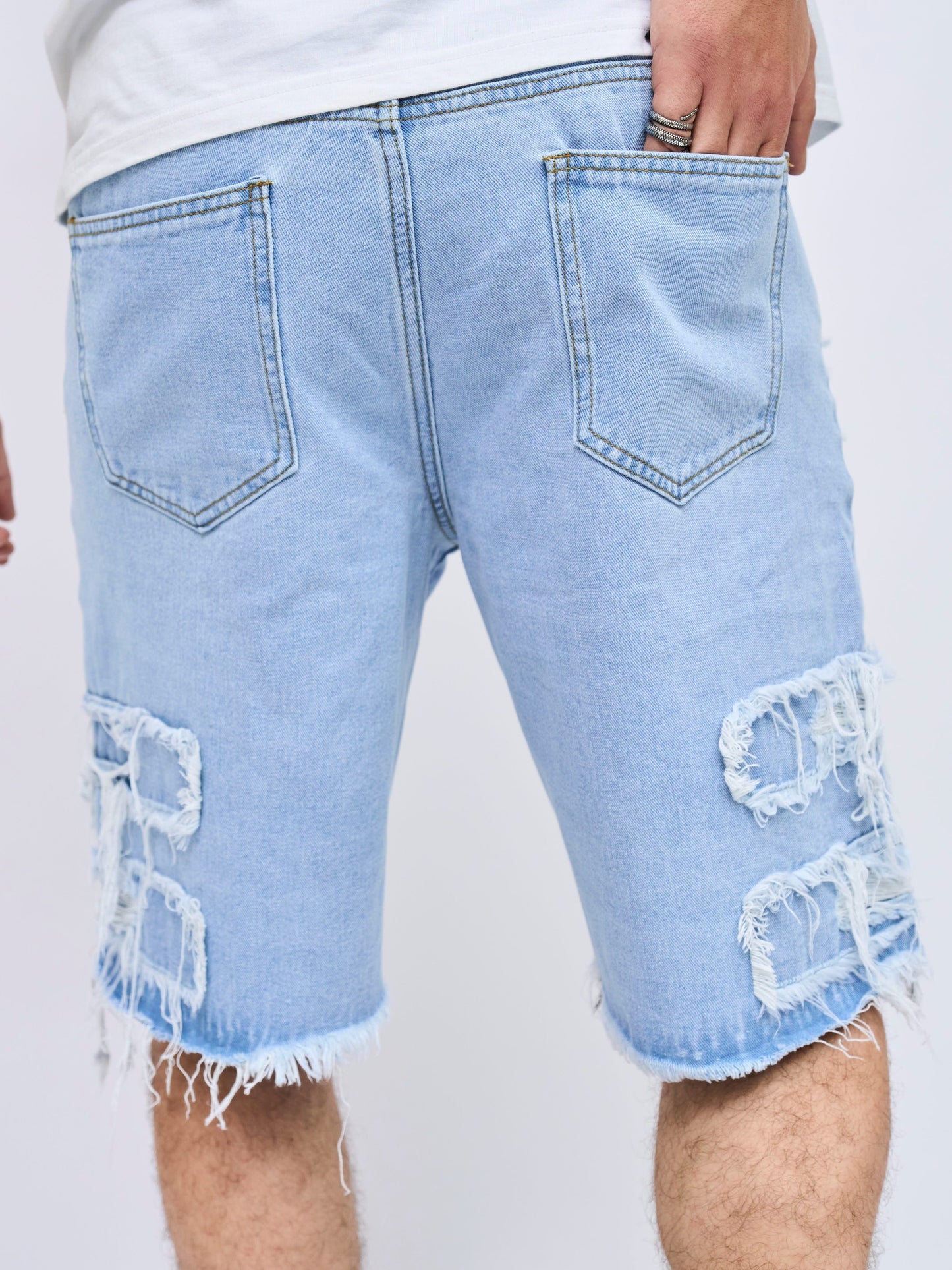 Men's distressed denim shorts with multiple pockets and frayed hem, made from cotton for plus size