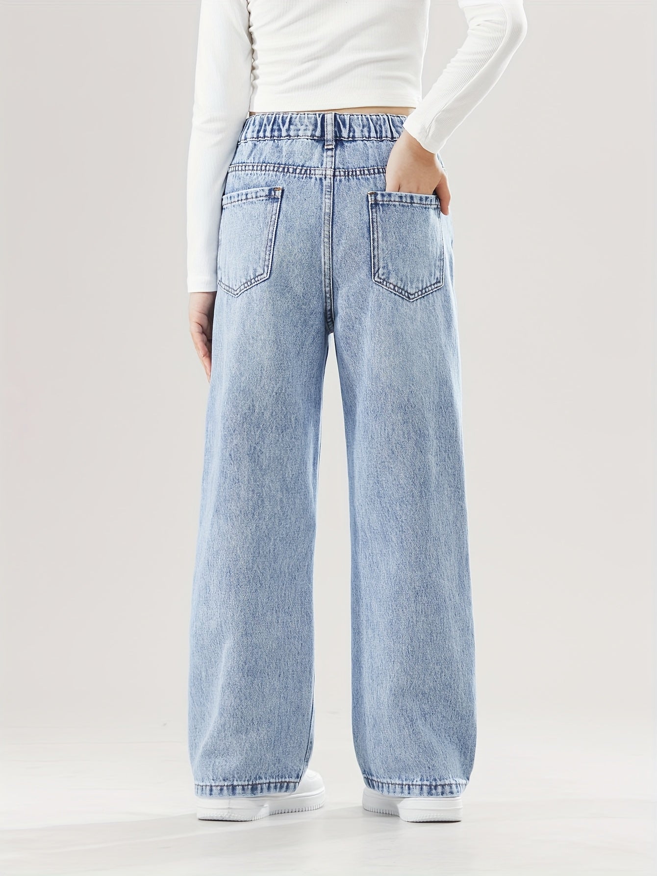 Women's relaxed fit denim pants with elastic waist