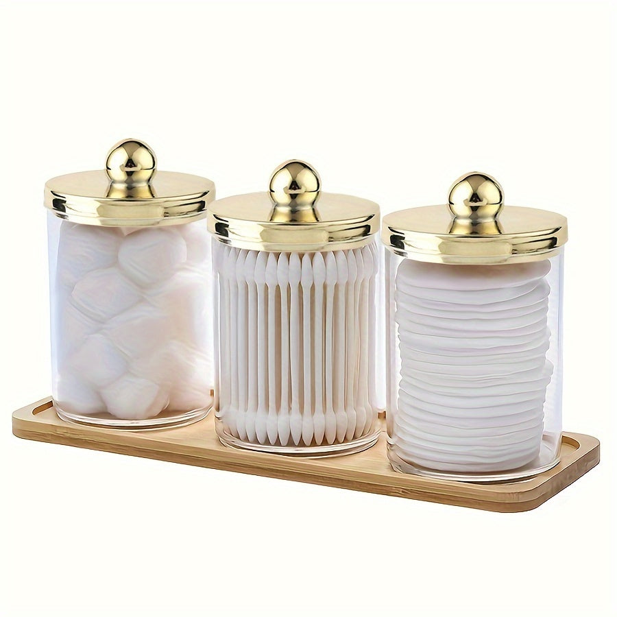 3-piece Qtip holder with tray, acrylic apothecary jars and lids for bathroom storage.