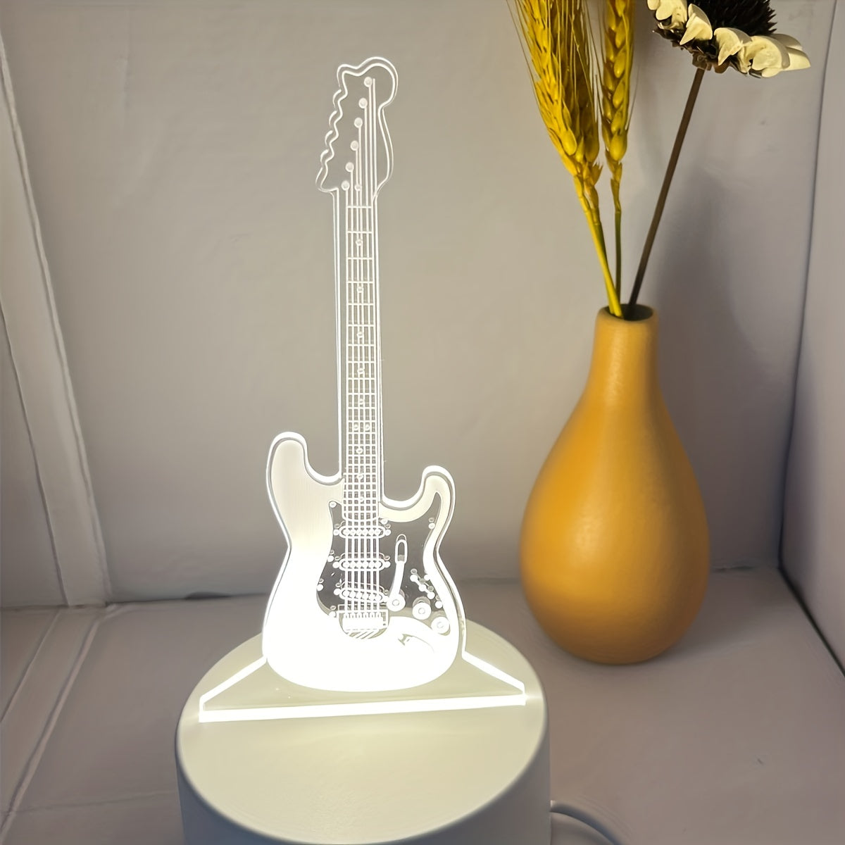 3D Guitar night light with warm white base, perfect gift for friends or room decoration.