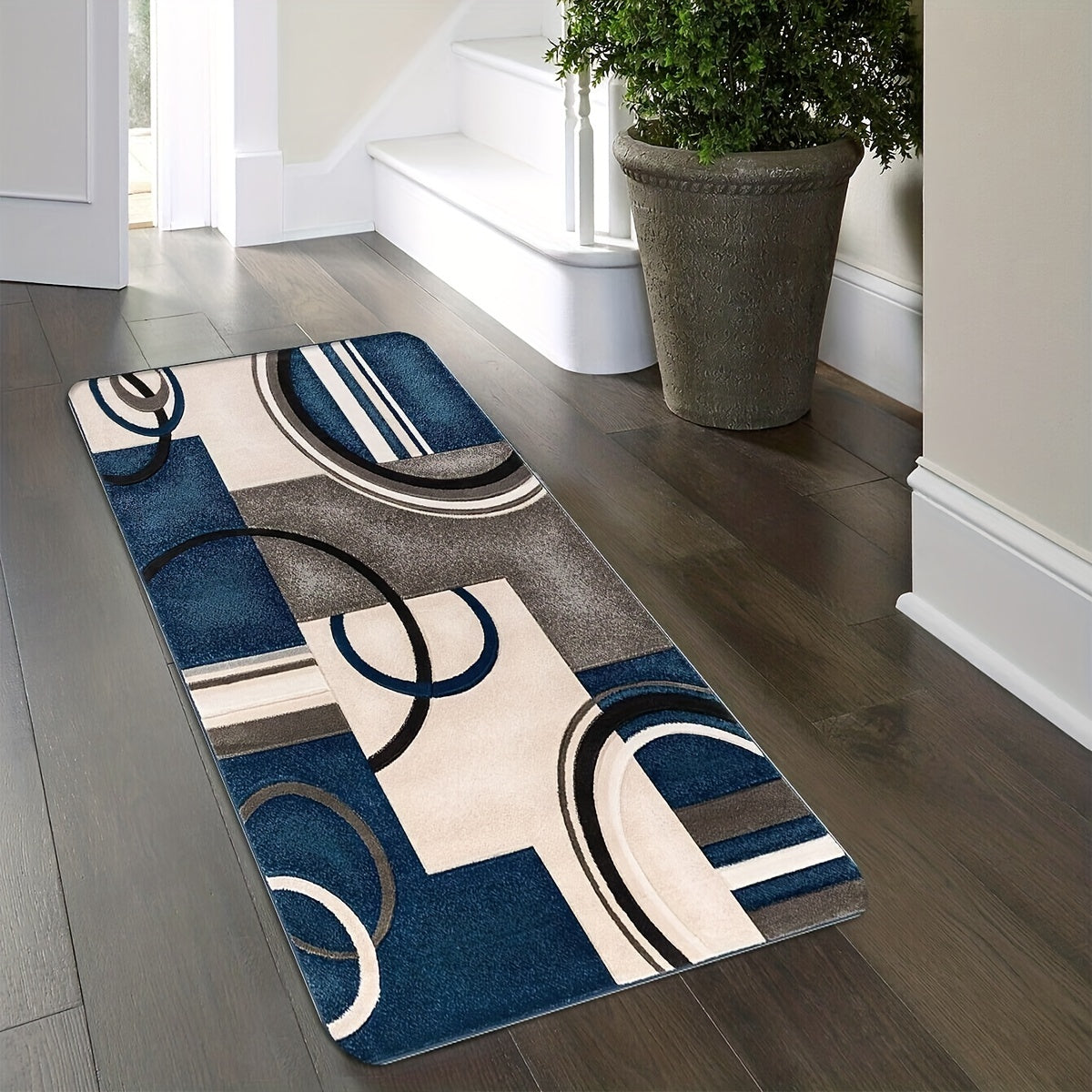 This home entryway mat is made of non-slip, absorbent polyester material. It is available in three sizes: 39.88x59.69 cm, 49.78x79.76 cm, and 44.7x119.38 cm.