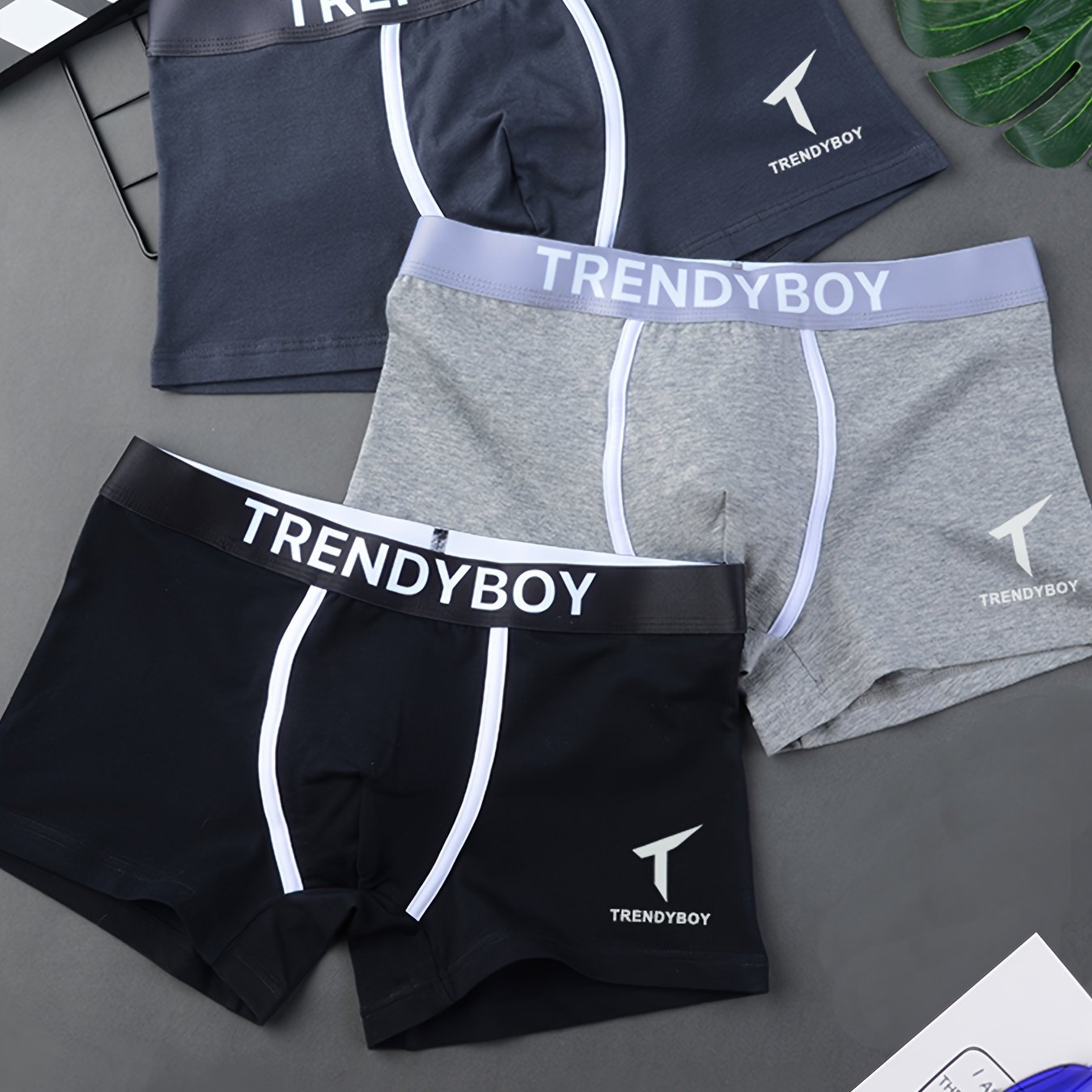 3 TRENDYBOY Men's Boxer Briefs: Soft & breathable polyester blend with comfort fit, elastic waistband, and sleek geometric pattern design for home & sports wear.