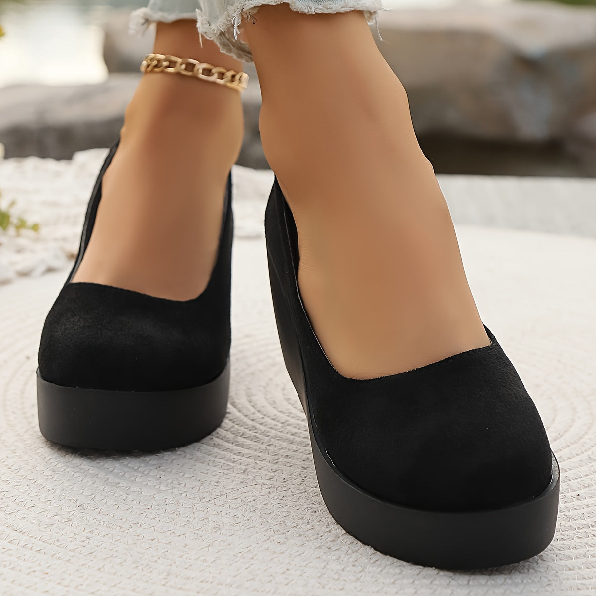 Women's stylish black slip-on platform wedge loafers for casual daily wear.