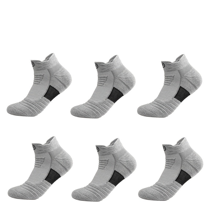 5 pairs of high-performance athletic compression socks for men in gray, black, and white. Made with breathable polyester and sweat-wicking material with a towel bottom, featuring a