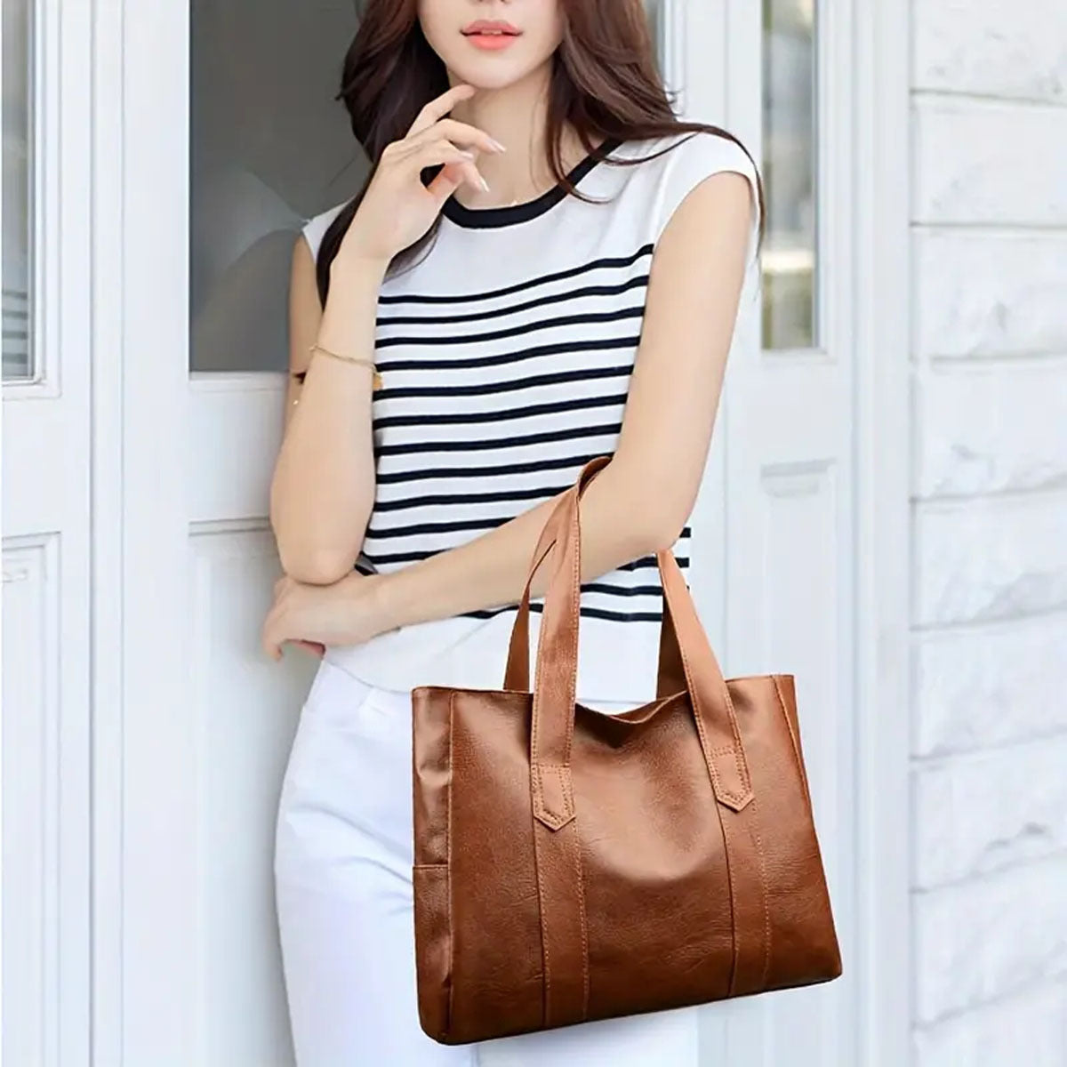 Stylish tote bag with safety zipper closure - perfect gift for women. Available in light brown, gray, or black. Spacious and versatile, perfect for daily use.