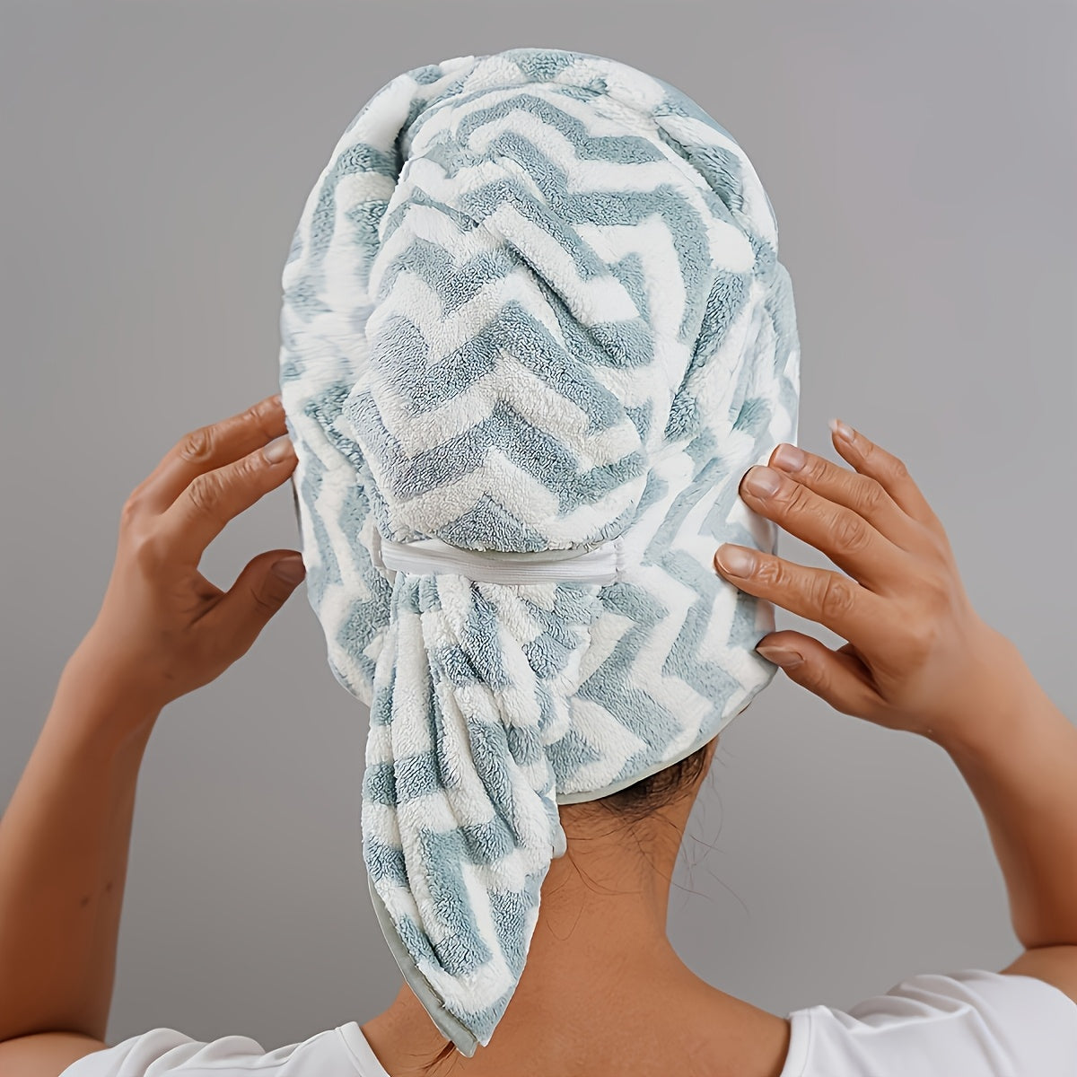 Ultra-soft hair towel wrap for women with quick dry and super absorbent features. Ideal for both long and short hair, with a modern geometric design - a bathroom essential.