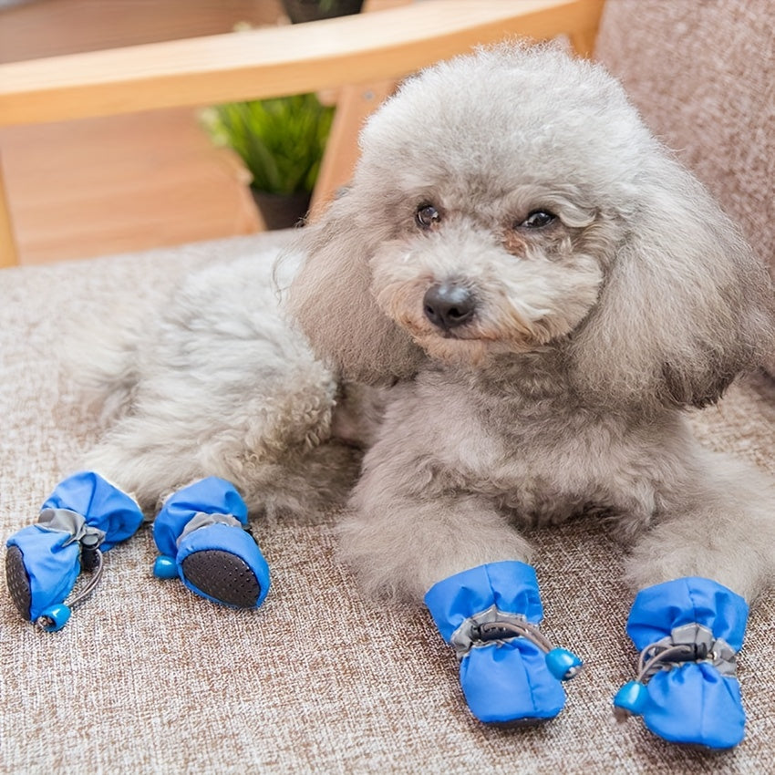 Set of 4 thickened, warm, and anti-skid dog paw protectors with elastic buckle.