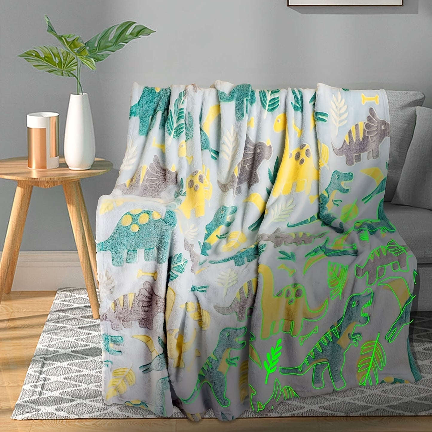 Soft fleece throw blanket for boys with glow-in-the-dark dinosaur design, makes the perfect birthday gift and is easy to clean in the washing machine.