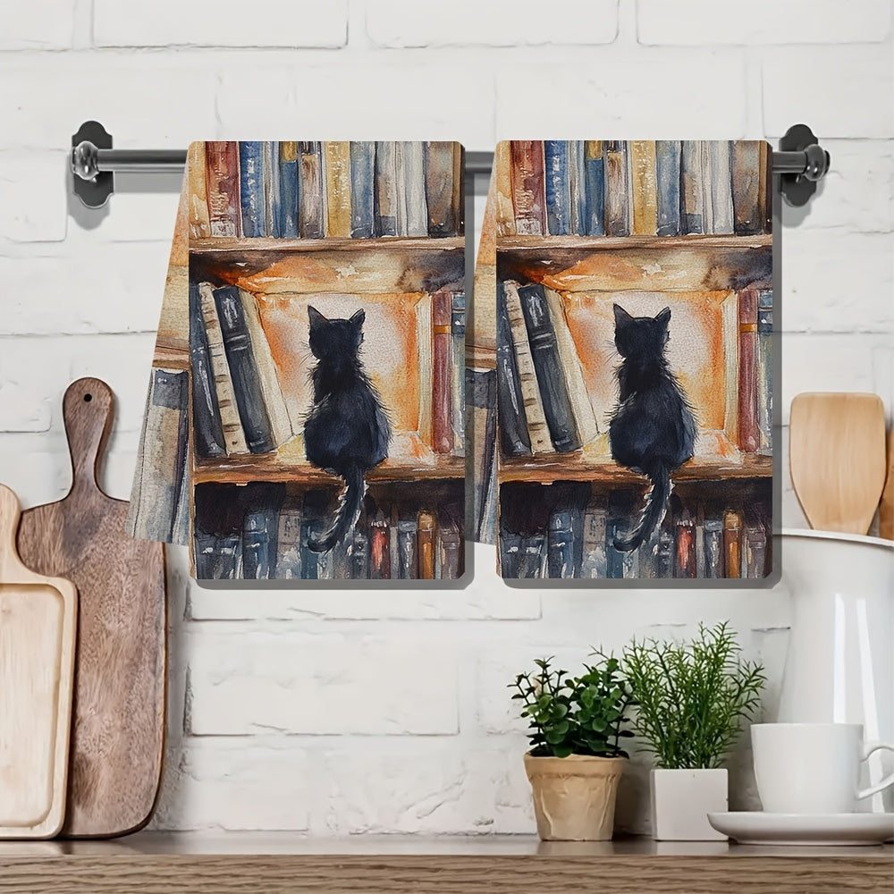 Two pieces of ultra soft kitchen towels featuring a charming library kitten design. These highly absorbent and machine washable dish hand towels measure a cozy 40.64x60.96 cm, making them perfect for home decor and practical for kitchen use.