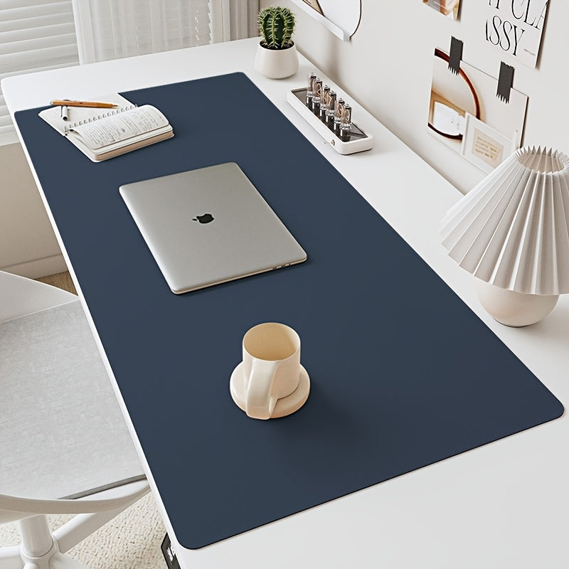 Waterproof faux leather desk mat for office use, non-slip and solid color with mouse pad & keyboard protector.