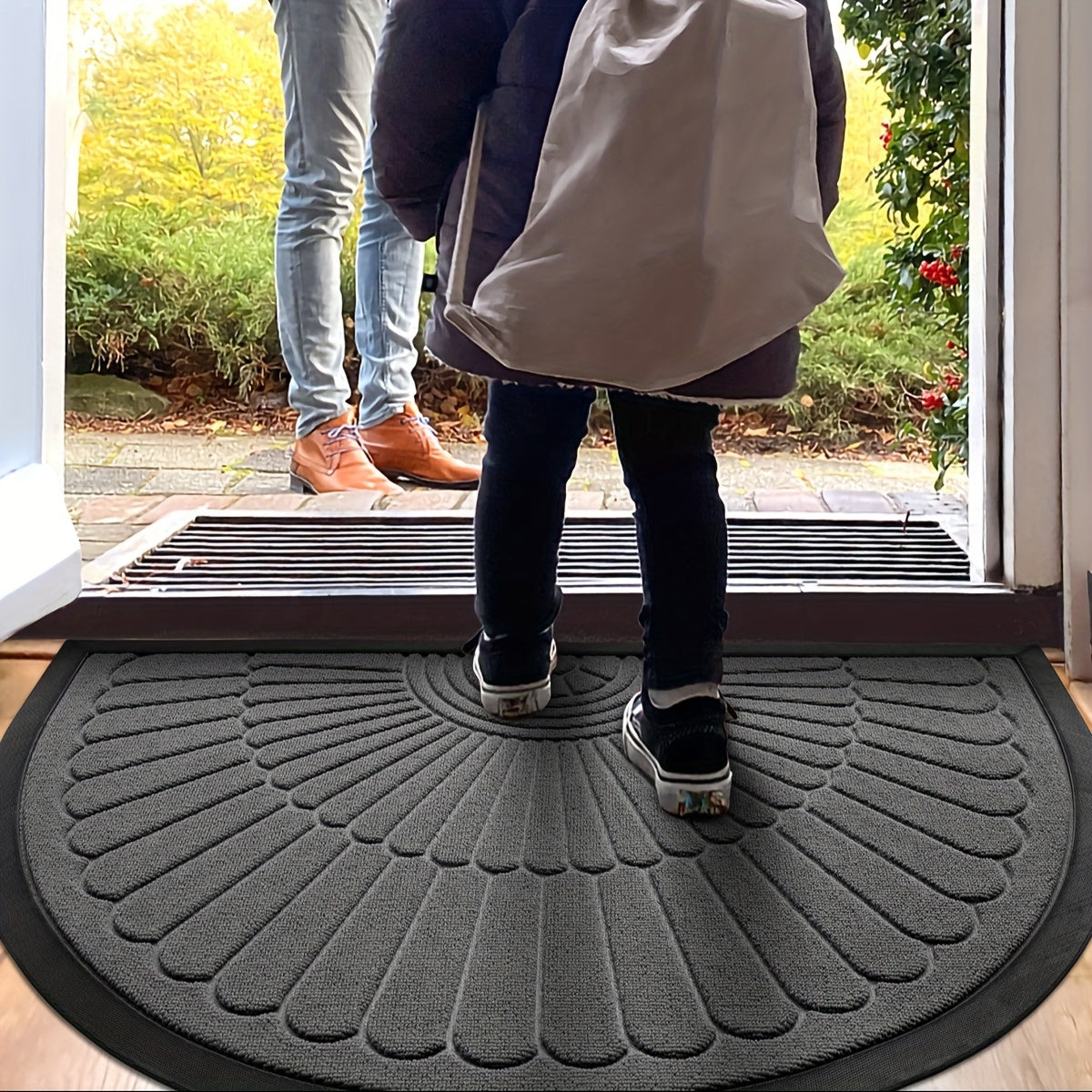 Half circle doormat made of polyester material. Can be used indoors or outdoors. Hand wash only. Ideal for entryway, balcony, patio, garage, and office. Dust-proof and anti-slip.