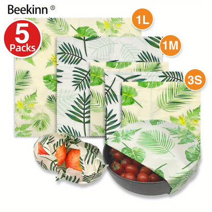 A 5-piece collection of eco-friendly Beeswax Food Wraps - Perfect for wrapping cheese, fruit, bread, snacks and more. These reusable wraps are non-stick and ideal for storing food in your kitchen pantry or refrigerator.